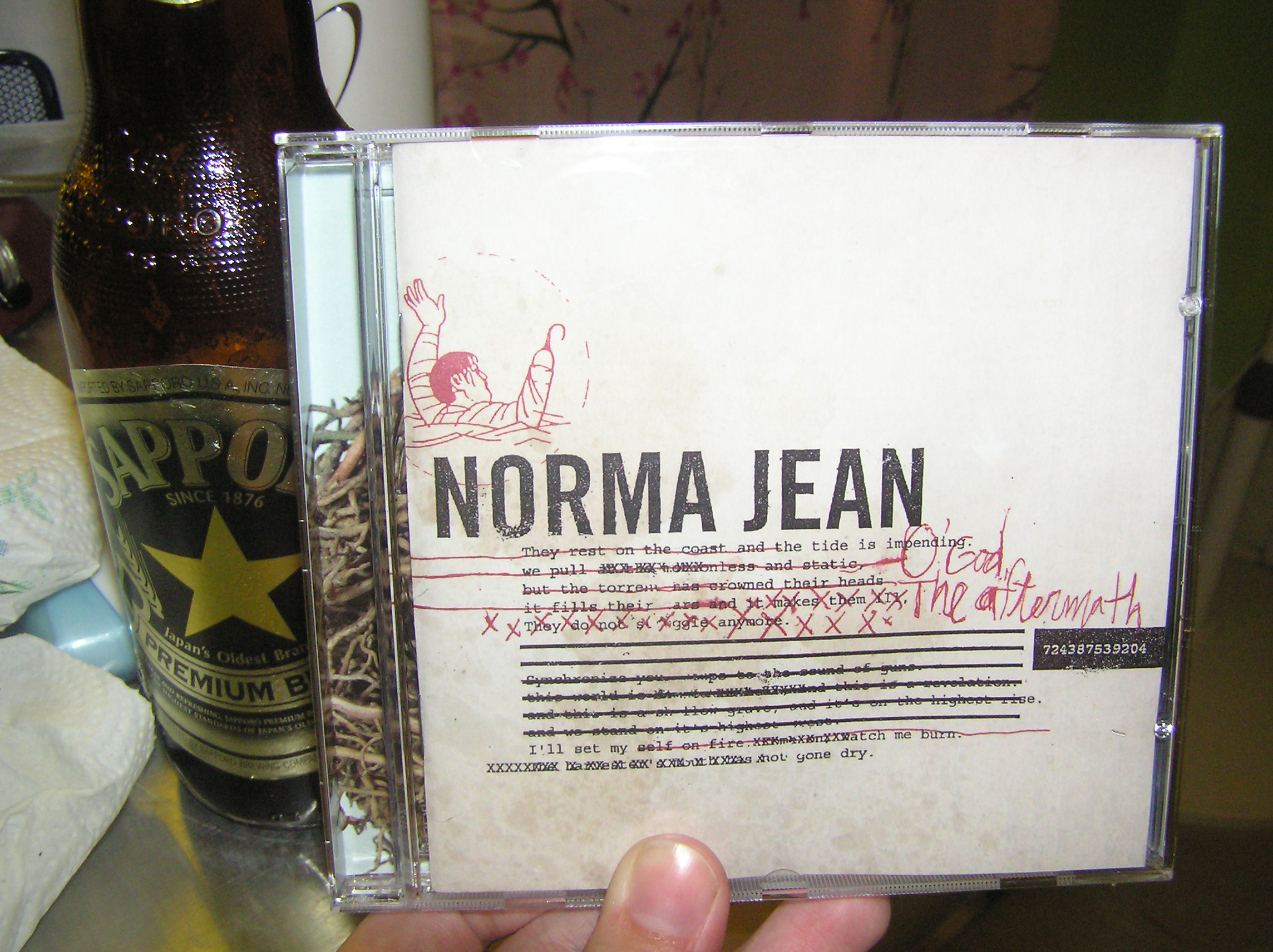 Norma_Jean-O_God_The_Aftermath-2005 - 00-norma_jean-o_god_the_aftermath-2005-cover-edg.jpg